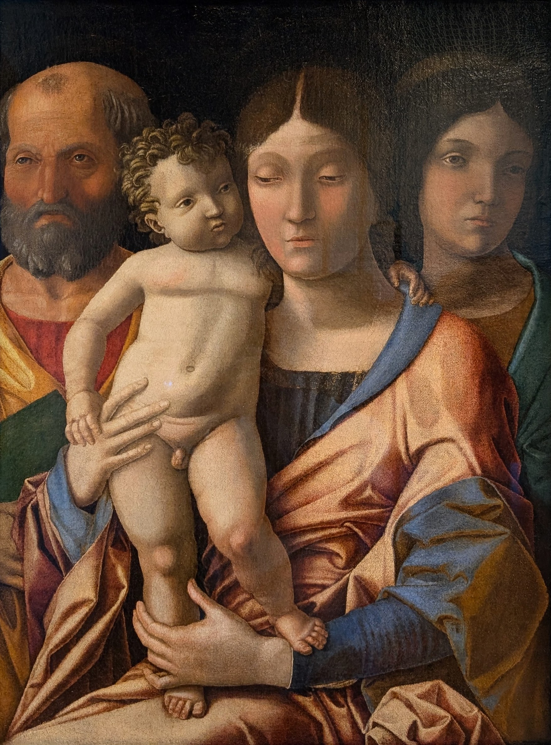 Sacra familgia con una santa by Andrea Mantegna
